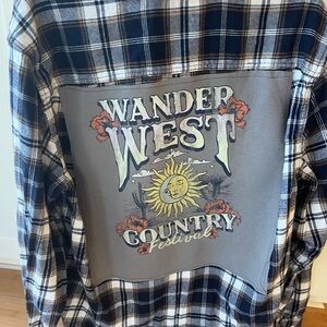 Repurposed plaid flannel with Wander West patch